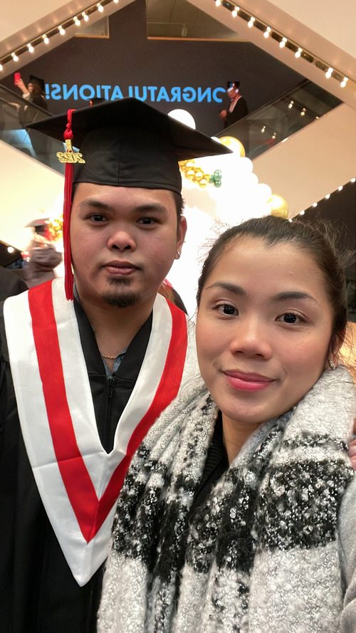 Ryan and is wife, Karyl, on his graduation day at ABM College