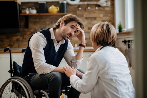 Lady worker helping her patient 