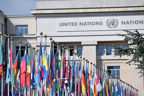 Hundreds of flags outside the United Nations as a symbol of global unity