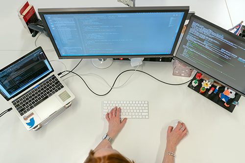 Three screens are better than one when writing and testing code