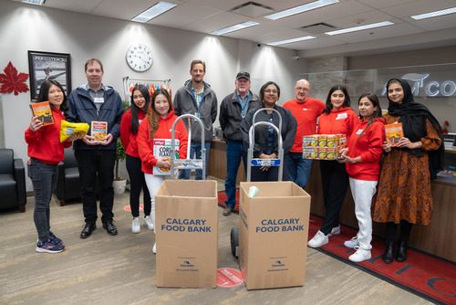 ABM Staff while donating for Calgary Food Bank