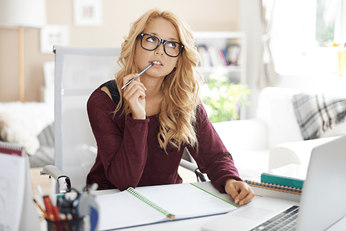 A traditional secretary concentrating on her clerical duties