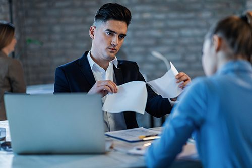 An employer so unimpressed with a resume that he tears it up