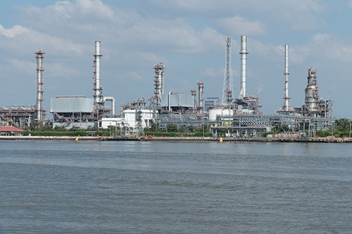 A large industrial petrochemical refinery on the waterfront