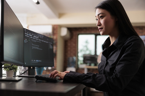 Young Woman working on network issues 