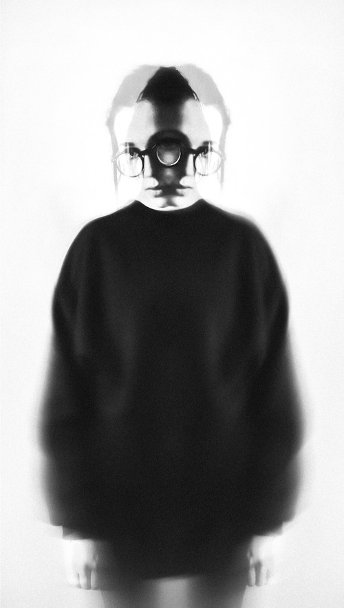 Black and white image of a person with mental illness