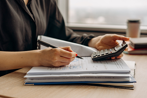 A Financial Planner hard at work on calculating Financial Stuff