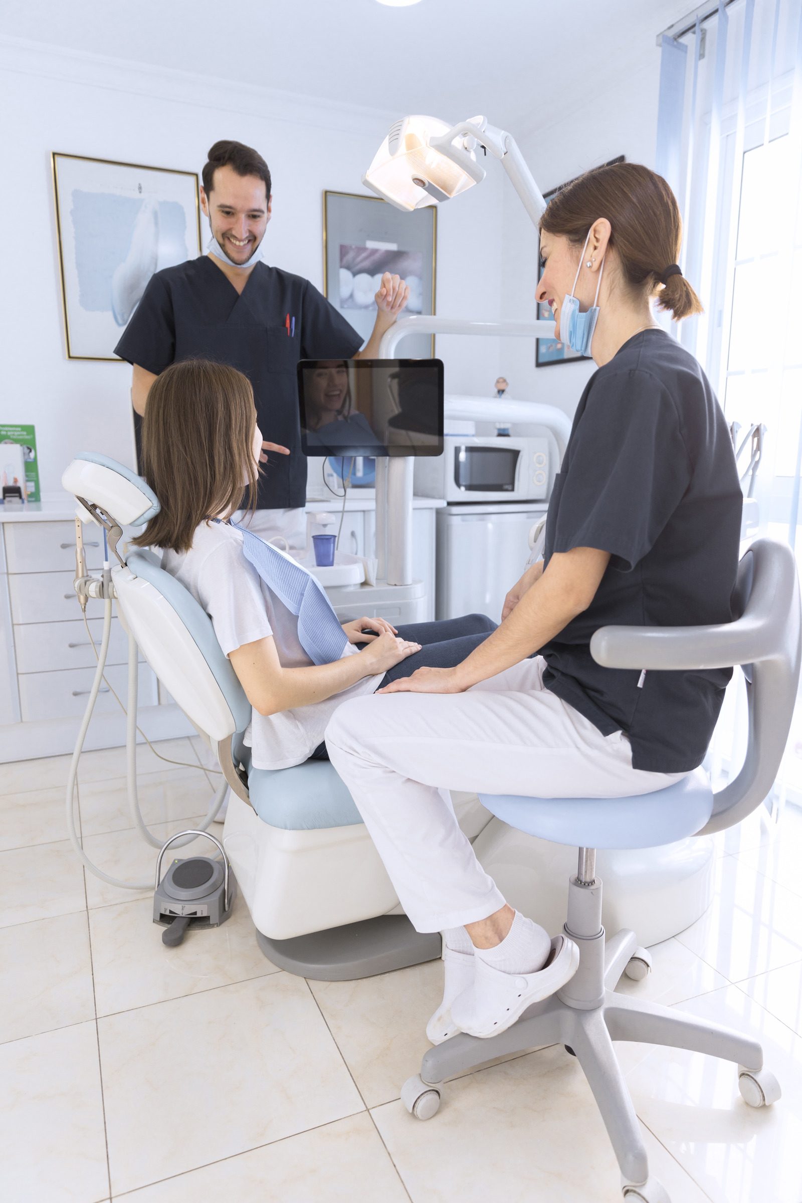 female patient in a dental chair - dental administrator assistant program