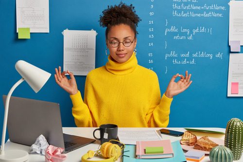 Women worker spotted doing  yoga at work to stay calm